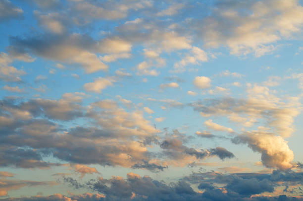 istock Clouds in evening late afternoon autumn blue southern sky 613897018