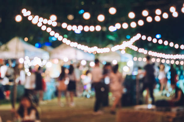 Festival Event Party with Hipster People Blurred Background Festival Event Party with Hipster People Blurred Background holiday event photos stock pictures, royalty-free photos & images