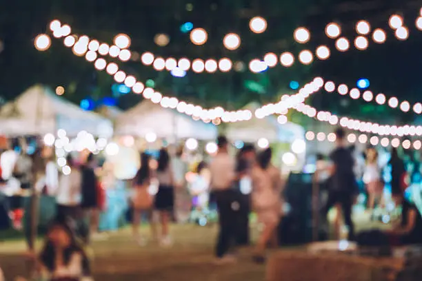 Photo of Festival Event Party with Hipster People Blurred Background
