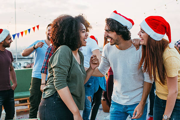 istock Friends on a Christmas party 613899944