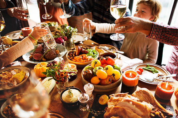 istock People Cheers Celebrating Thanksgiving Holiday Concept 613903206