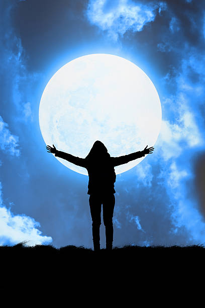 istock Girl enjoying the night sky. 613903352