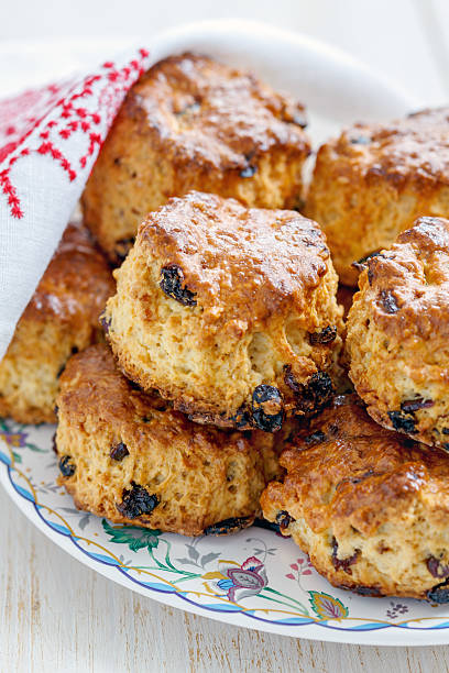 istock Homemade scones with dried berries and white napkin. 613904342