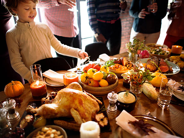 istock People Celebrating Thanksgiving Holiday Tradition Concept 613905108