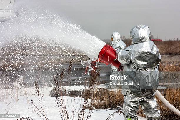 Fill The Airplane With Firefighting Foam Stock Photo - Download Image Now - Firefighter, Foam - Material, Extinguishing