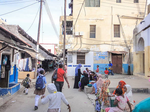 African people of Lamu town Lamu, Kenya - September 3, 2013: African people on the street of Lamu town in Kenya. Eastern Africa xxi stock pictures, royalty-free photos & images