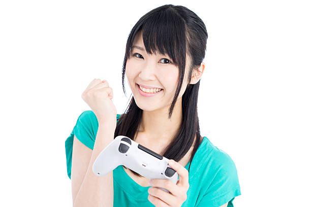 istock Woman playing video games 614011504