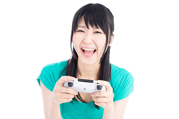 istock Woman playing video games 614011670