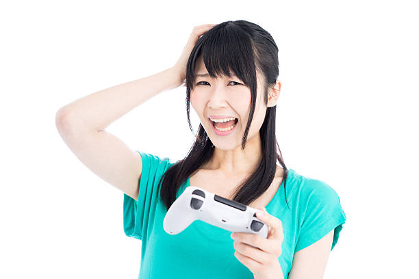 istock Woman playing video games 614011730