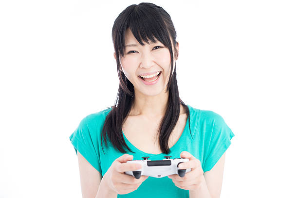 istock Woman playing video games 614011812
