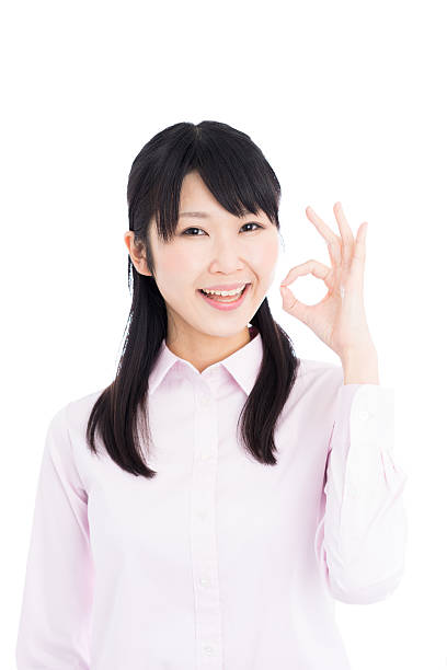 istock Businesswoman making ok sign 614012376