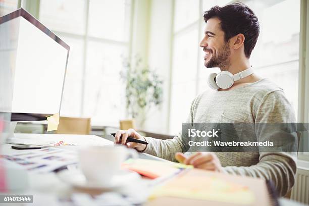 Smiling Businessman Working On Computer In Office Stock Photo - Download Image Now - Adult, Adults Only, Blank