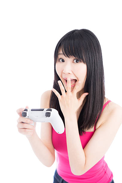 istock Woman playing video games 614014024