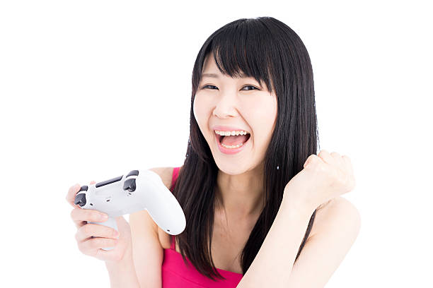 istock Woman playing video games 614014140
