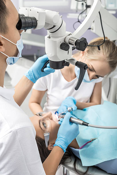 istock Girl at dentist's office 614014550