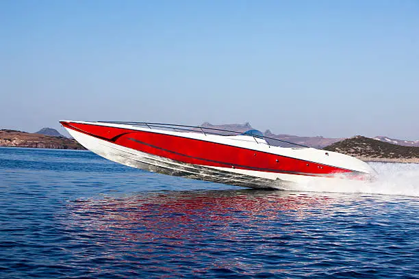 luxury speedboat speeding across the sea