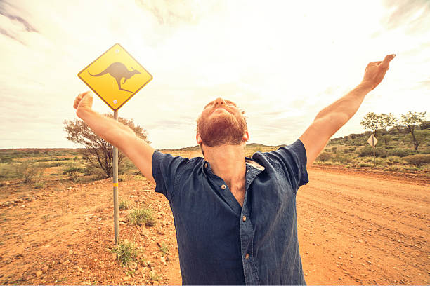 istock Man arms outstretched in Australia 614019284
