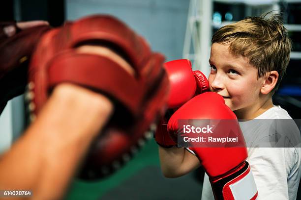 Boy Boxing Training Punch Mitts Exercise Concept Stock Photo - Download Image Now - Boxing - Sport, Child, Sport