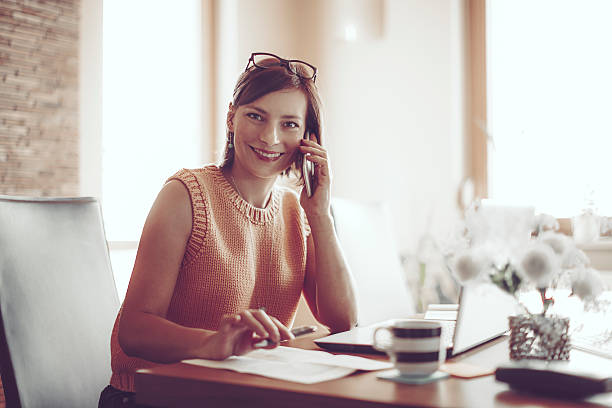 istock Beautiful young woman at home 614020938
