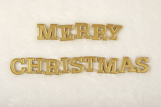 istock Merry christmas golden text on a white 614022654