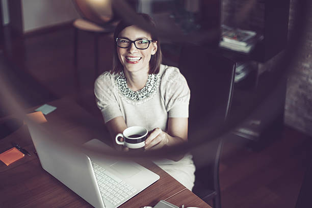 istock Beautiful young woman at home 614023626