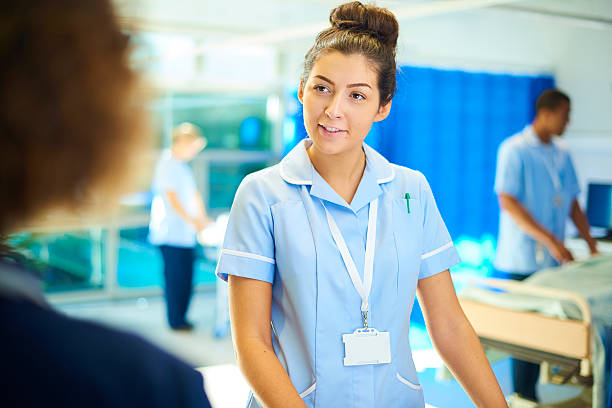 istock young nurse chatting to ward sister 614024236