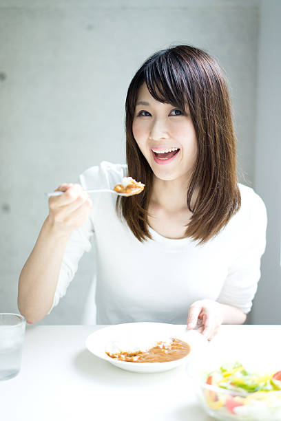 Woman eating a meal