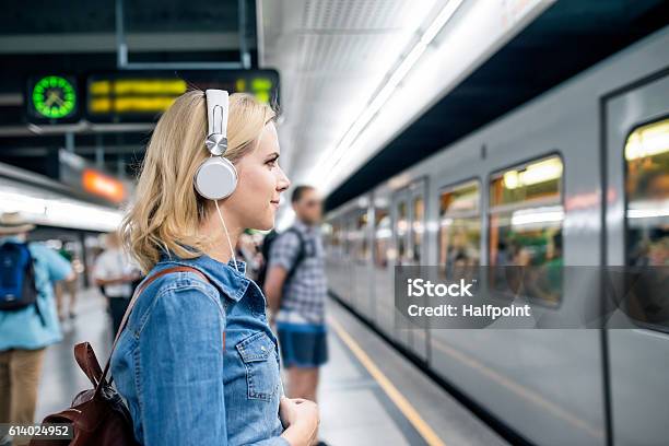 Young Woman In Denim Shirt At The Underground Platform Waiting Stock Photo - Download Image Now