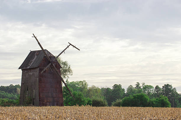 istock Kawnice, Poland. Old ruined windmill on the field. 614025018
