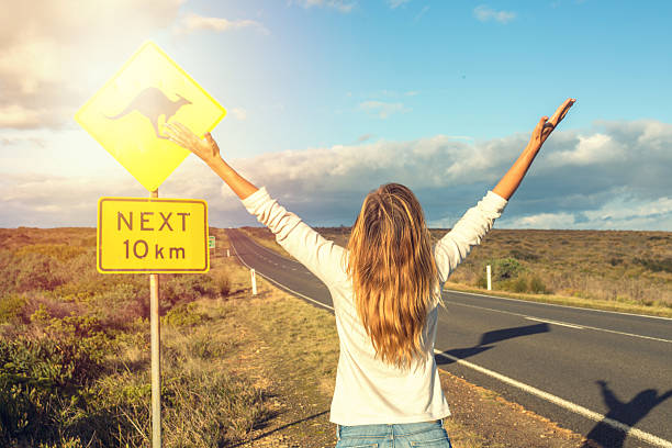 istock Cheerful woman enjoying Australia 614026900