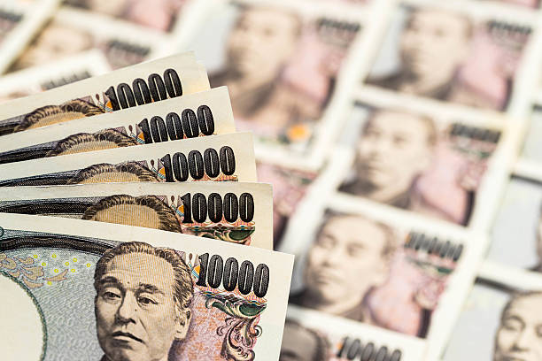 japanische zehntausend-yen-banknote - japanischer yenschein stock-fotos und bilder