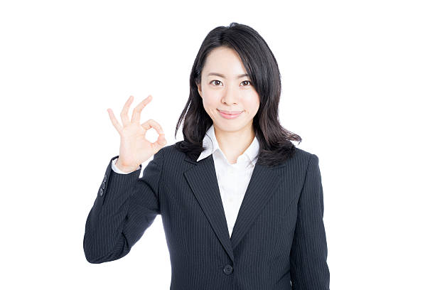 istock Businesswoman making ok sign 614028768