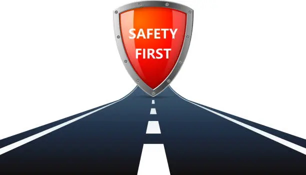Vector illustration of Safety first sign on road