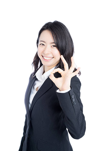 istock Businesswoman making ok sign 614028888