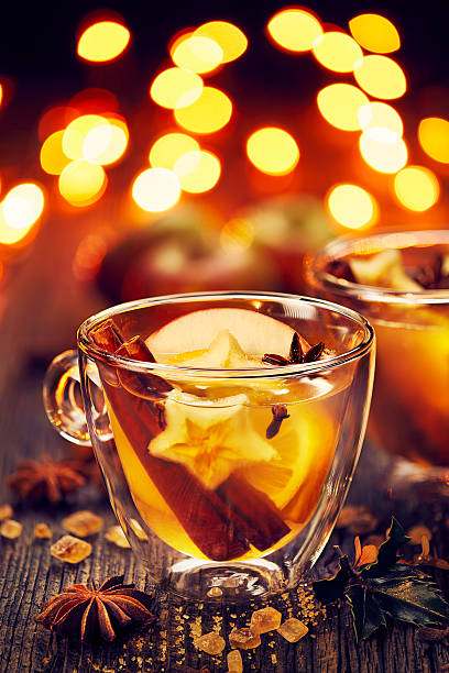 istock Mulled cider in the glass on a wooden table 614029758