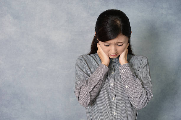 istock Disappointed Asian woman 614029940
