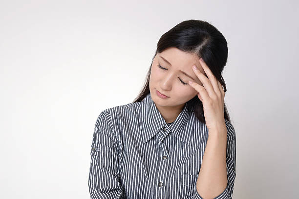 istock Disappointed Asian woman 614031208