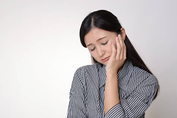 istock Disappointed Asian woman 614031348