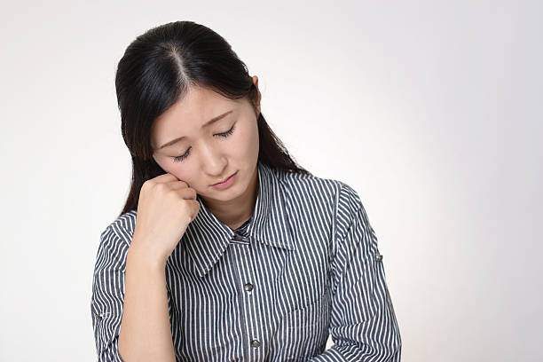istock Disappointed Asian woman 614033184