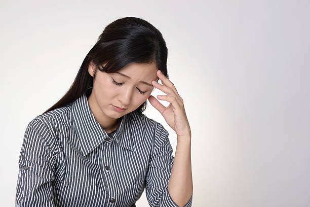 istock Disappointed Asian woman 614033416