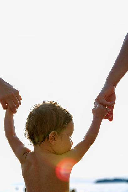 istock Relaxed baby on the beach 614033834