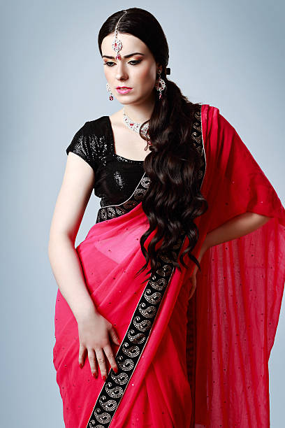 istock beautiful Indian woman posing 614033838