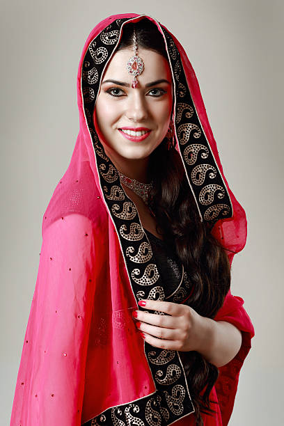 istock happy indian woman 614033948