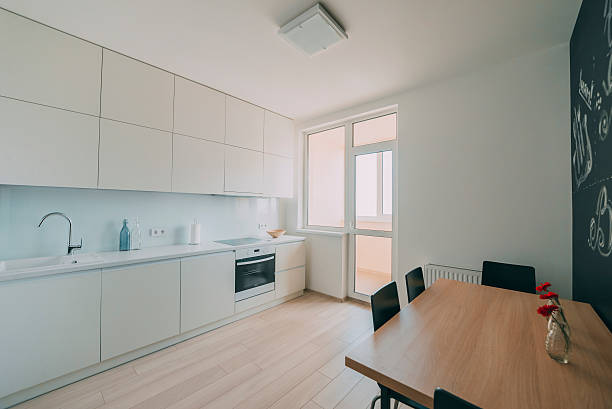 istock Light interior with flooring in a modern apartment 614034170
