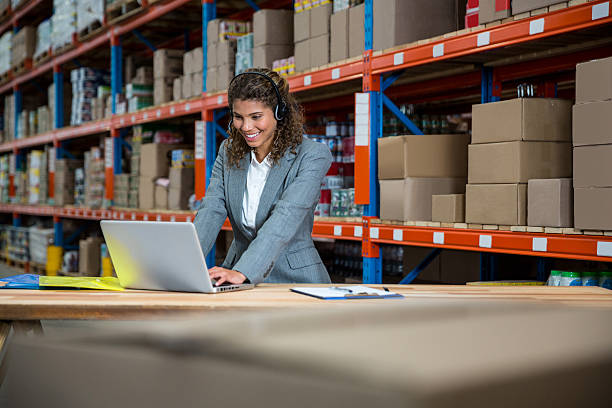 istock Business woman is talking with a headset 614034722