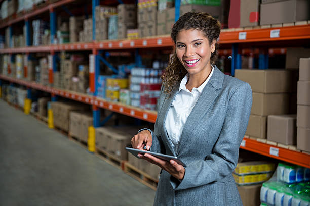 istock Business woman posing with her tablet 614034910
