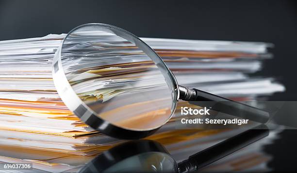 Documents Search Stock Photo - Download Image Now - Magnifying Glass, Document, Examining