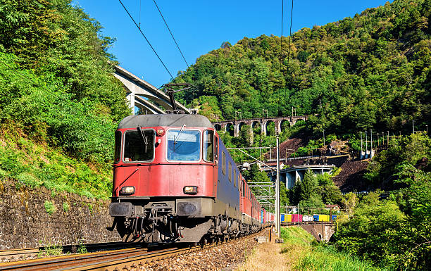 istock Freight train goes down the Gotthard pass - Switzerland 614038062