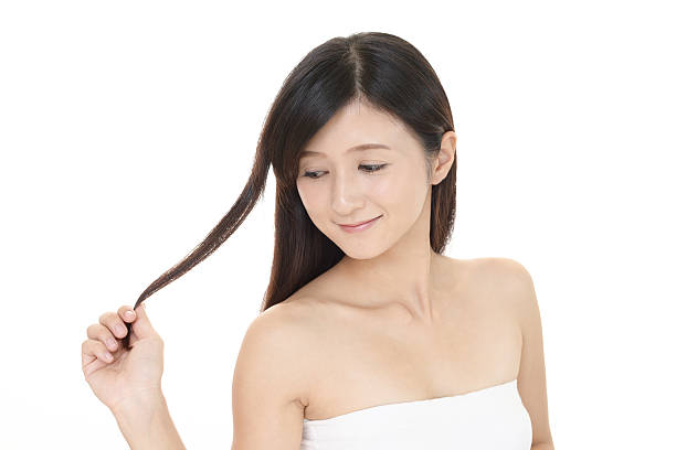 istock Woman with beautiful long hair 614039058