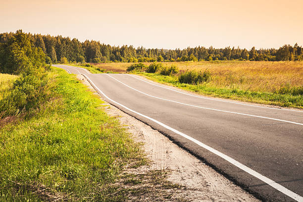 istock Rural highway, toned landscape photo 614039434